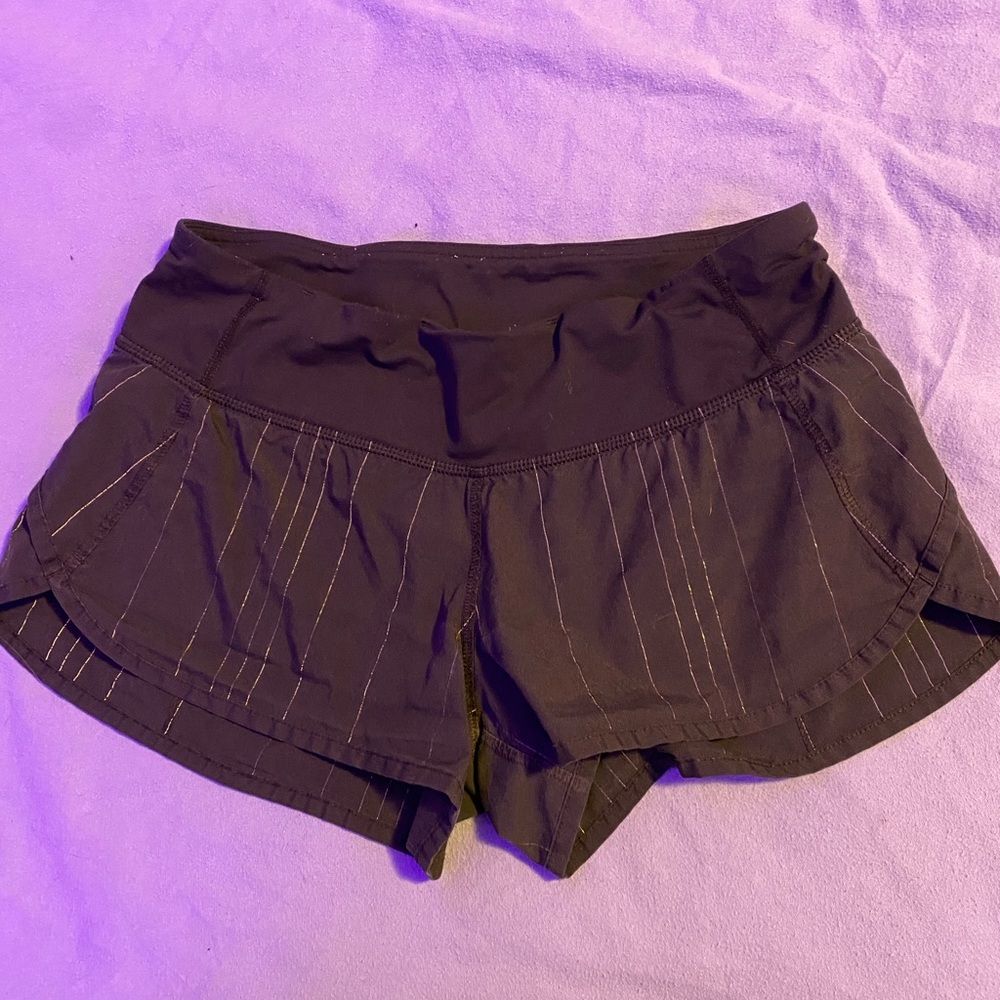 black lululemon shorts with sliver strips